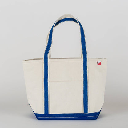Personalized canvas tote in natural cream canvas with Cobalt trim, embroidered in San Antonio
