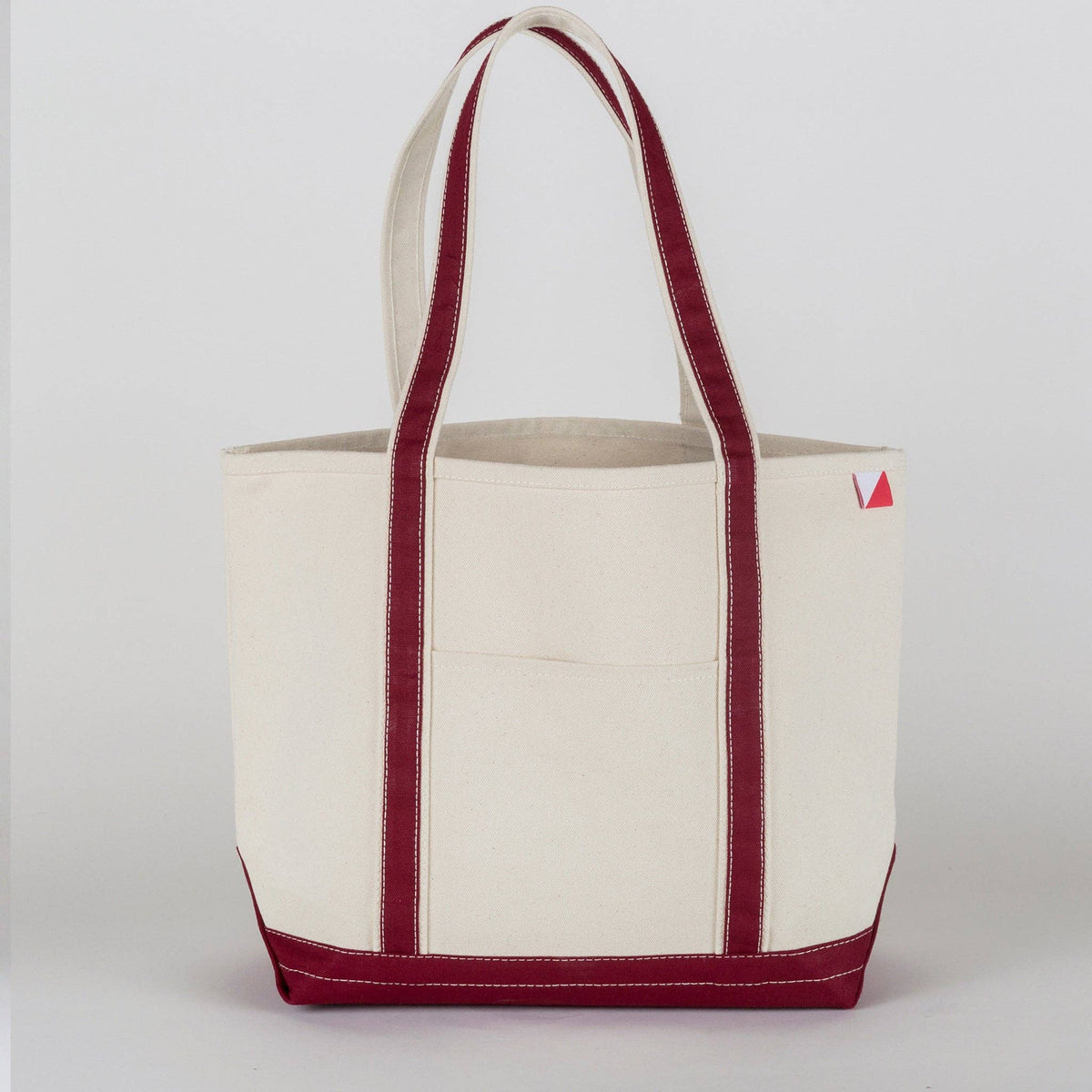 Personalized canvas tote in natural cream canvas with Maroon trim, embroidered in San Antonio