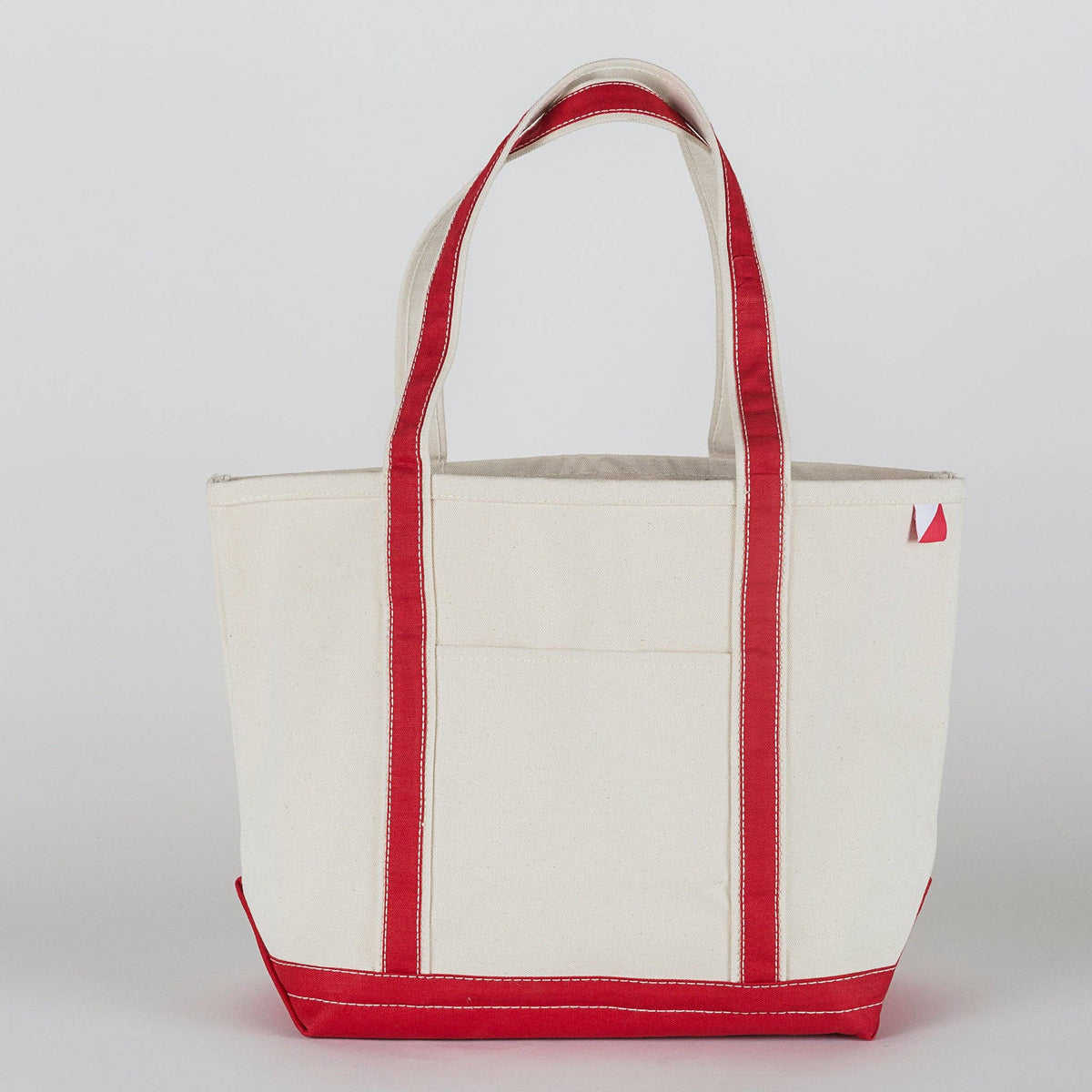 Personalized canvas tote in natural cream canvas with Red trim, embroidered in San Antonio