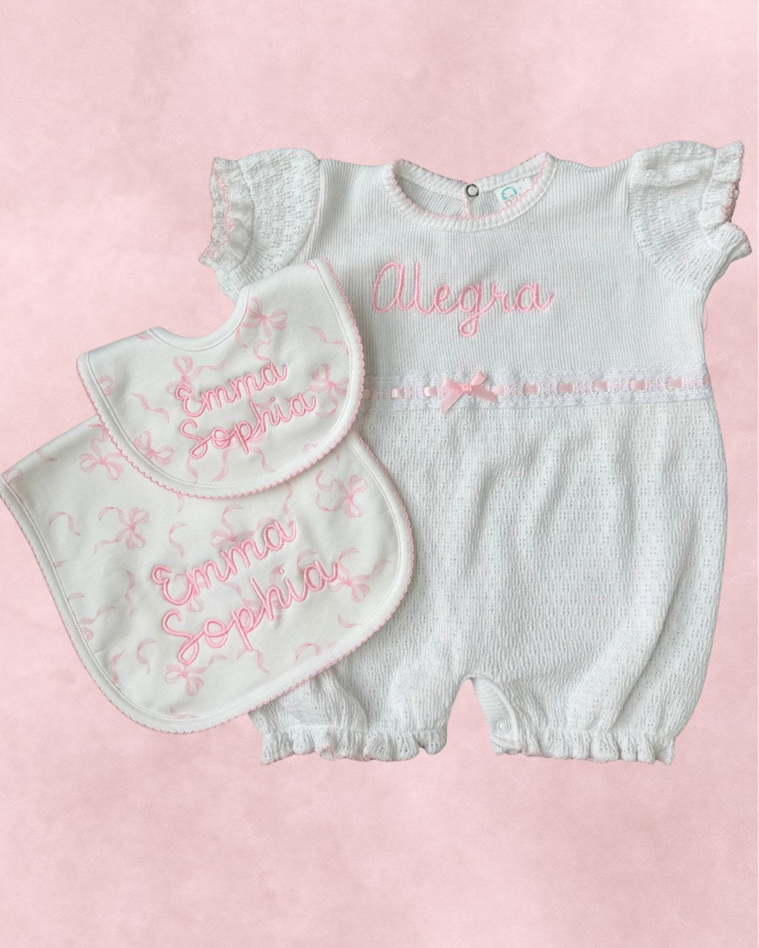 A personalized baby gift set — romper and bibs embroidered with their names